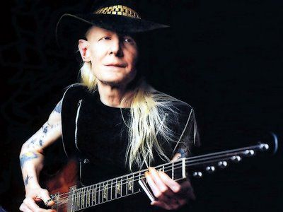 Johnny Winter performing solo on stage